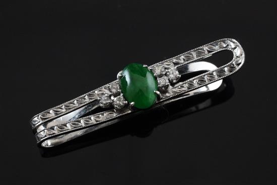 A cabochon jade and diamond set clip, 1.5in.